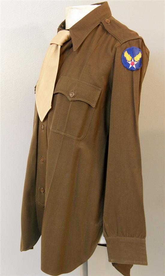 Appraisal: US Military officer's uniform Jacket with various badges shirt and