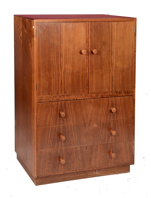 Appraisal: A GORDON RUSSELL WALNUT LINEN CHEST possibly designed by Dick