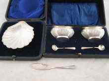 Appraisal: A silver butter shell hallmarked Sheffield with glass liner and