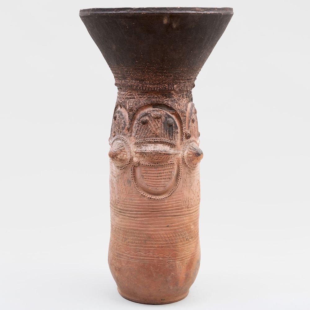 Appraisal: Large Nupe Cylindrical Terracotta Vessel Nigeria With geometric decoration and