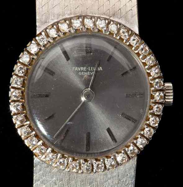 Appraisal: Lady's White Gold Diamond Wristwatch Favre-Leubathe circular silver-tone dial with