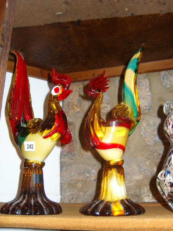 Appraisal: A matched pair of Venetian glass cockerels in yellow red