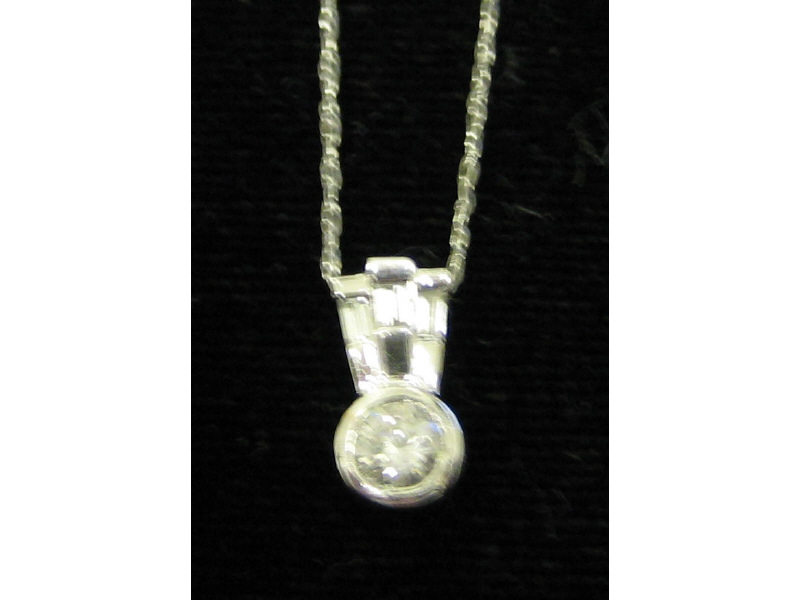 Appraisal: DIAMOND PENDANT k white gold pendant with bezel set round