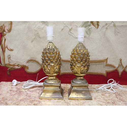 Appraisal: Pair of composite gold toned lamp bases in the shape