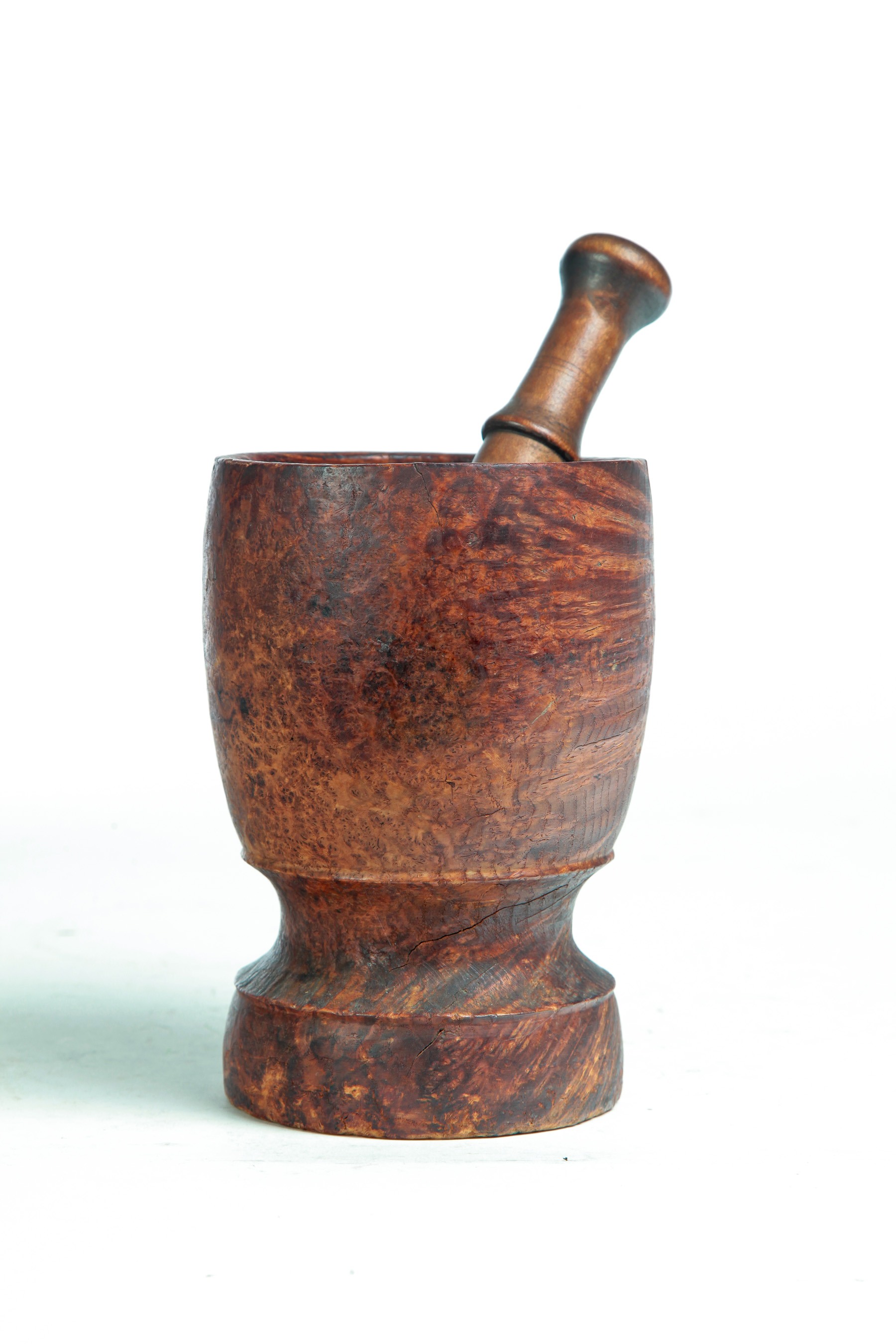 Appraisal: AMERICAN BURL MORTAR Nineteenth century Turned mortar with wooden pestle