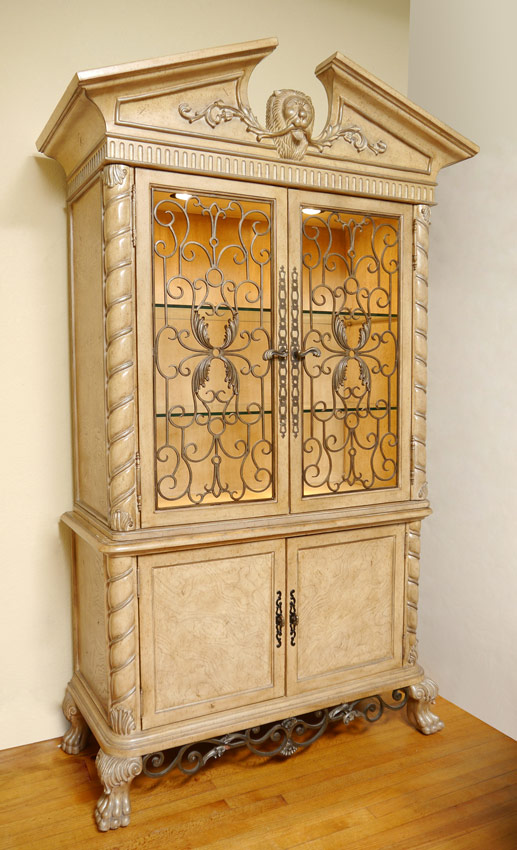 Appraisal: CONTEMPORARY ITALIAN RENAISSANCE STYLE DISPLAY CABINET Surmounted by a lion's