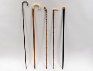 Appraisal: GROUP OF FIVE ASSORTED WALKING CANES Two with bone handles