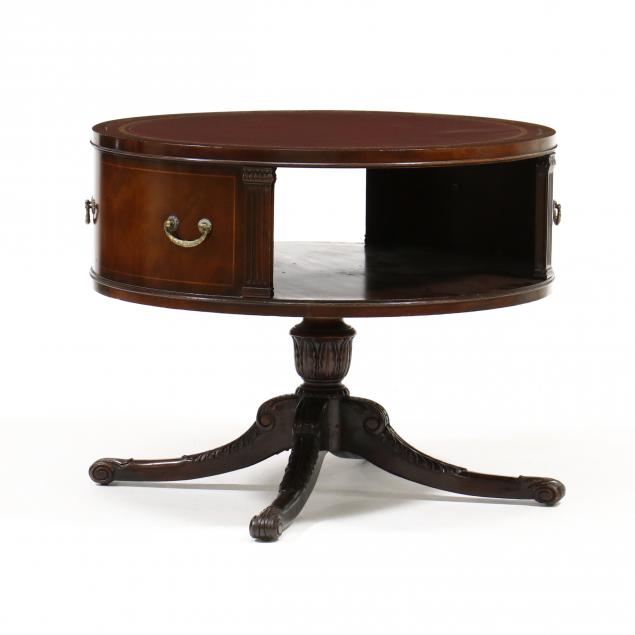 Appraisal: GEORGIAN STYLE LEATHER TOP MAHOGANY DRUM TABLE Mid th century