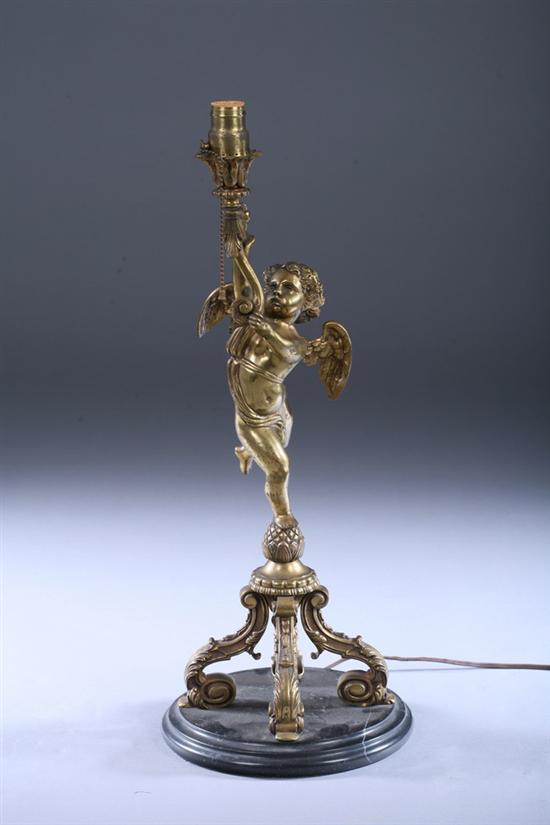 Appraisal: CONTINENTAL GILT-BRONZE FIGURAL CANDLESTICK th century Quadripartite base of acanthus-capped