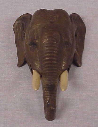 Appraisal: Metal elephant head form call buzzer with faux ivory tusks