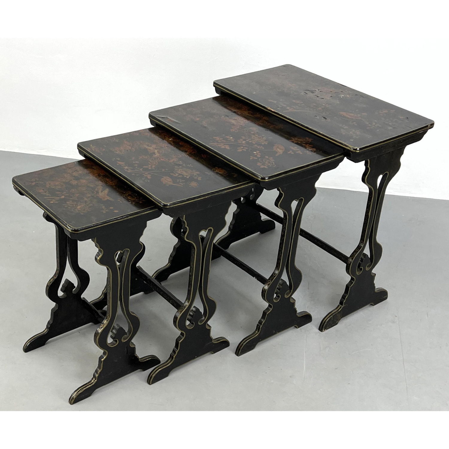 Appraisal: Set Ebonized Lacquered Wood Nesting Tables Asian lacquered design with