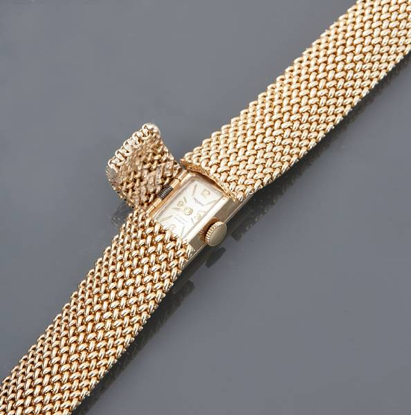 Appraisal: A k gold covered dial bracelet wristwatch Swiss comprised of