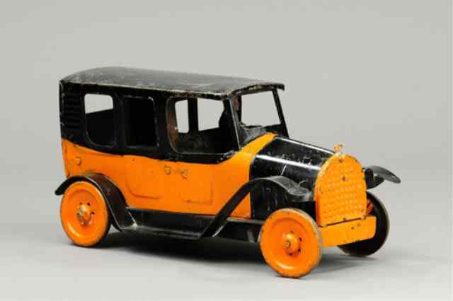 Appraisal: REPUBLIC TAXI CAB c pressed steel painted in familiar orange