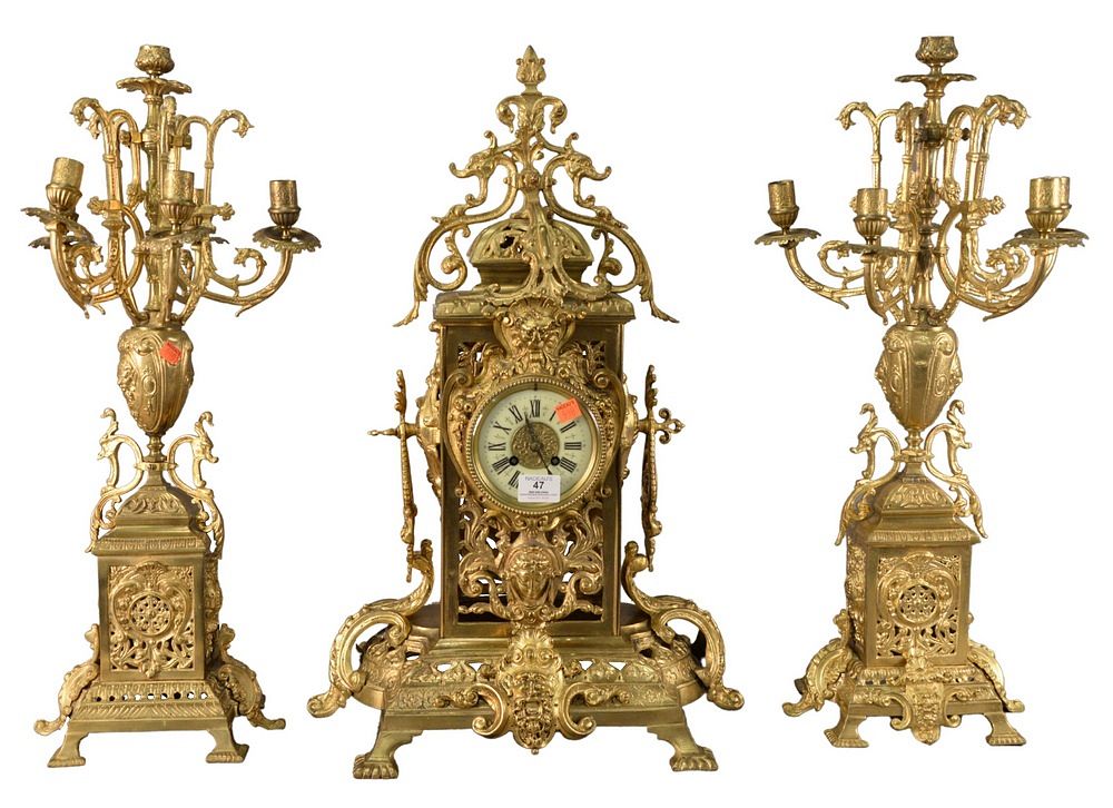 Appraisal: Three Piece Brass Mantle Set to include a clock and