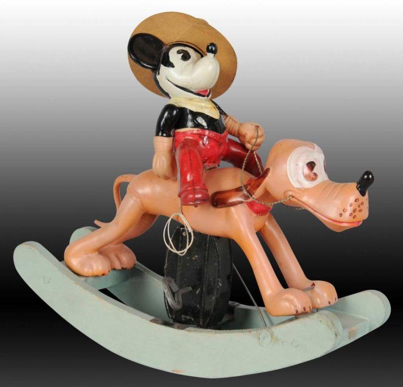 Appraisal: Disney Celluloid Mickey Mouse Cowboy on Pluto Toy Description Includes