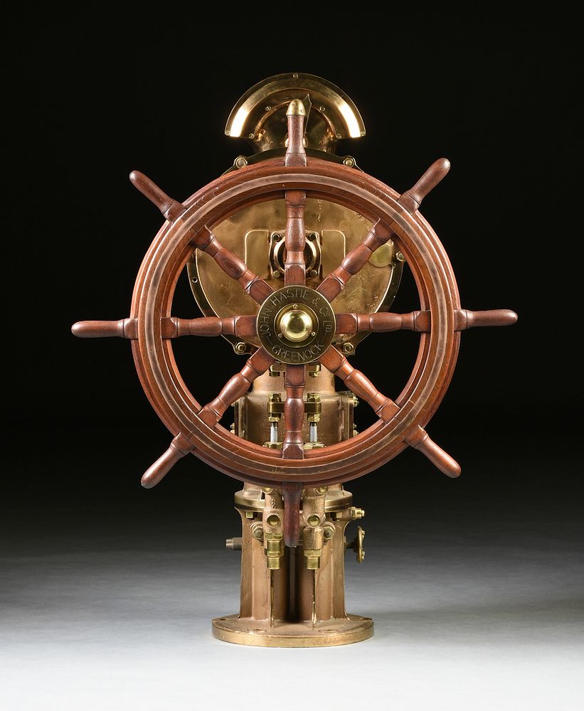 Appraisal: A SCOTTISH MAHOGANY SHIP'S WHEEL ON POLISHED BRASS STEERING PEDESTAL