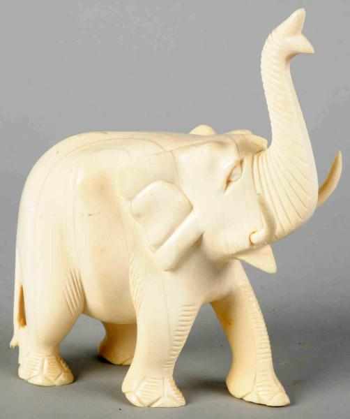 Appraisal: Carved Ivory Elephant with Trunk Up Condition Excellent Size T