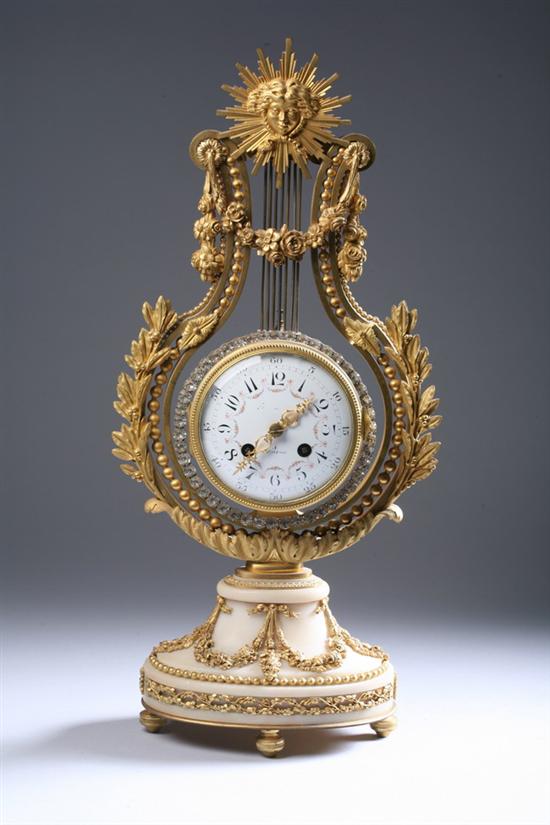 Appraisal: EMPIRE ORMOLU-MOUNTED WHITE MARBLE MANTLE CLOCK early th century works