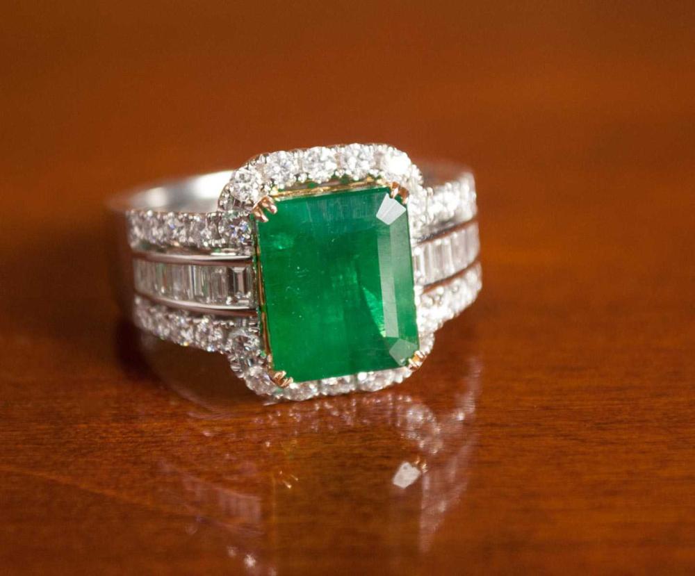 Appraisal: EMERALD DIAMOND AND EIGHTEEN KARAT GOLD RING with GIA Emerald