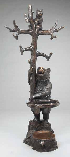 Appraisal: A Bronze Hallstand the fanciful bear support in the manner