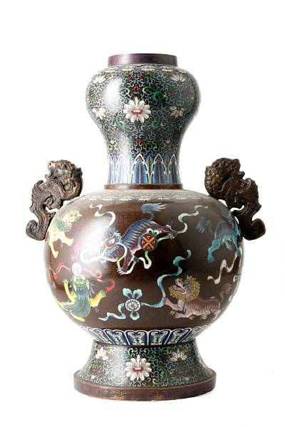 Appraisal: A pair of cloisonne enameled metal garlic-headed vases with attached