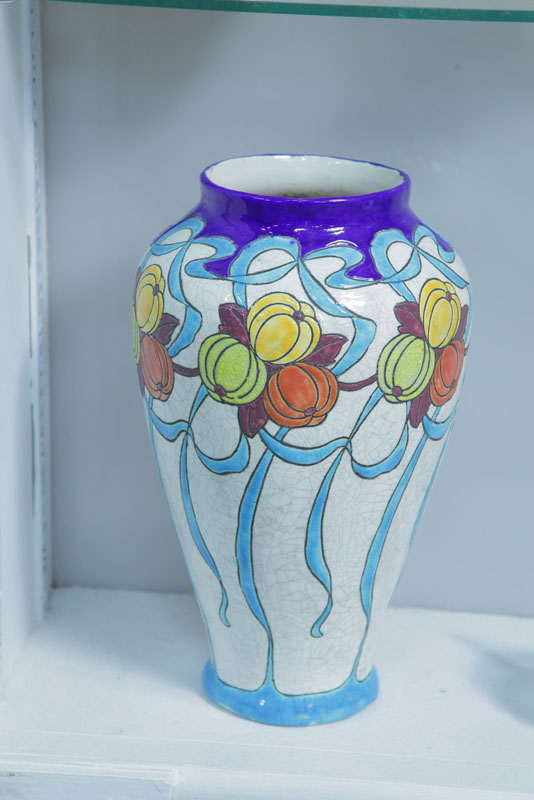 Appraisal: BOCH FRERES POTTERY VASE Large vase with polychrome fruit and