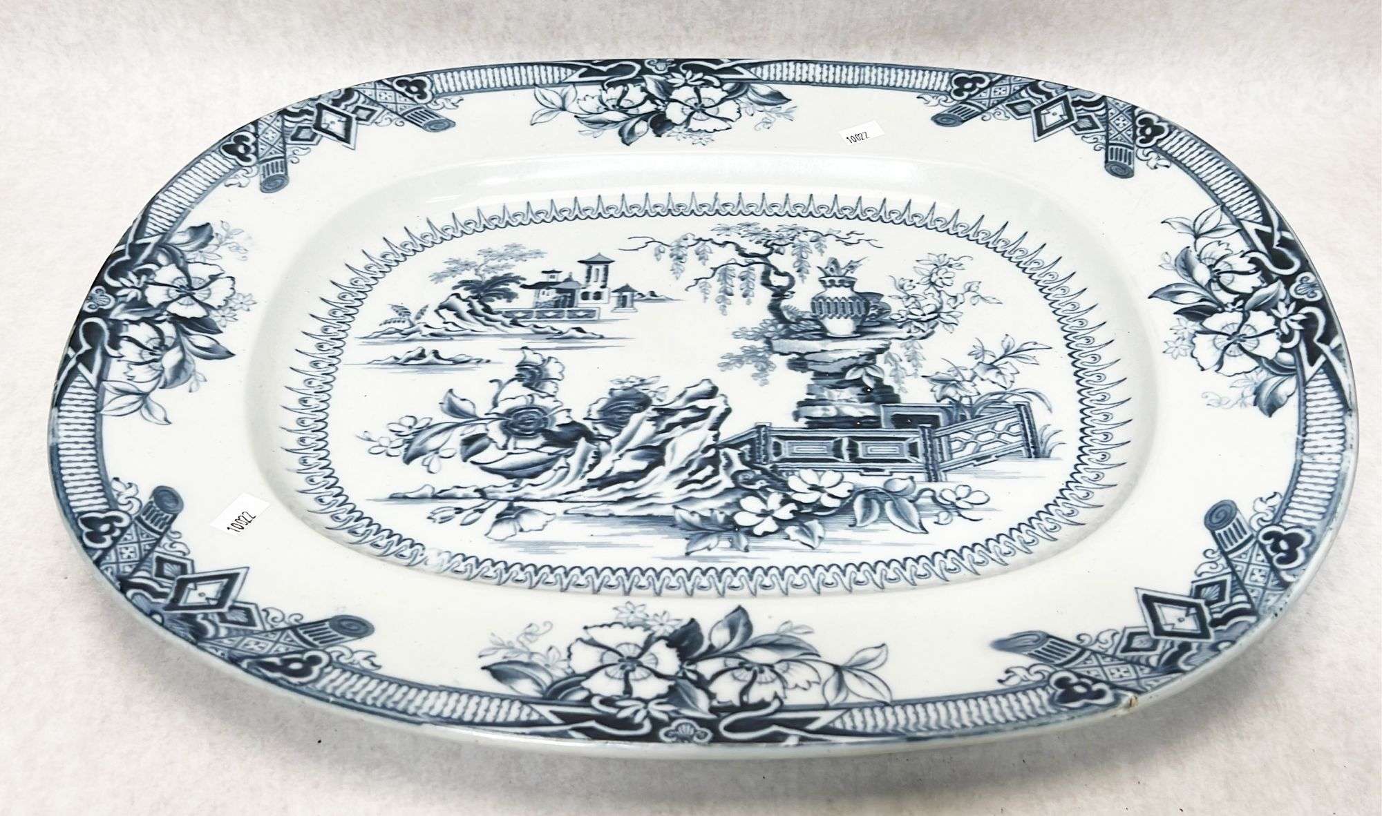 Appraisal: English flow blue ironstone platter thC Marked with pattern name