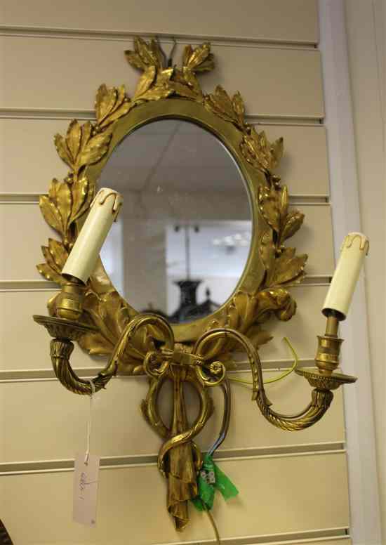 Appraisal: A pair of French gilt brass Louis XV design gilt