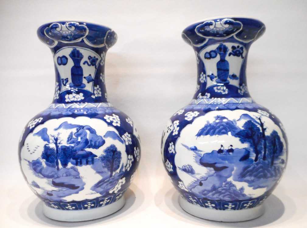 Appraisal: PAIR CHINESE QING BLUE AND WHITE PORCELAIN VASES featuring cartouches