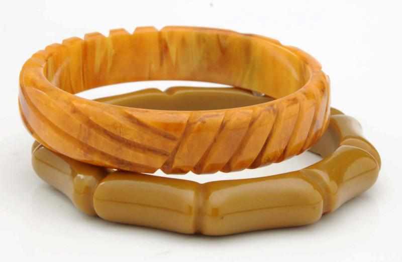 Appraisal: Lot of Bakelite Bracelets Both are carved Includes one in