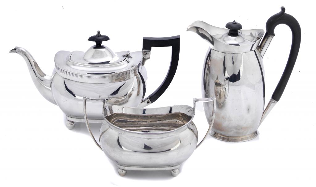 Appraisal: A GEORGE V REEDED OBLONG TEAPOT AND SUCRIER AND A