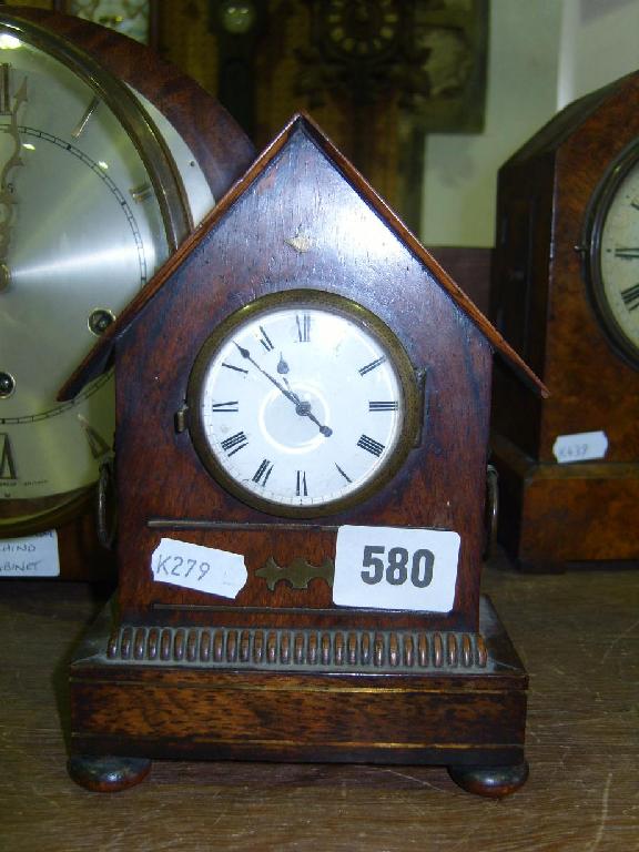 Appraisal: A small Regency rosewood mantle clock of architectural form with