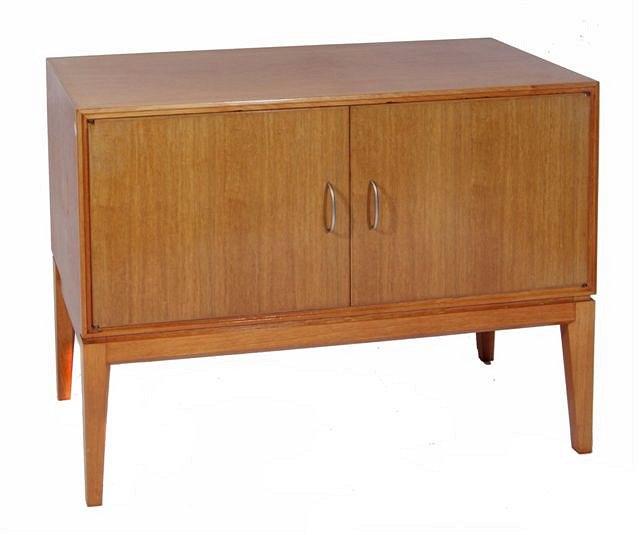 Appraisal: A GORDON RUSSELL GOLDEN OAK SIDE CABINET with two doors