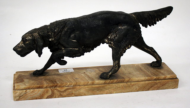 Appraisal: AN OLD SPELTER SCULPTURE of a pointer dog mounted on