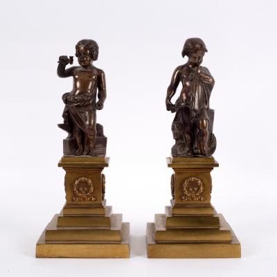 Appraisal: A pair of bronze figures of putti one with an