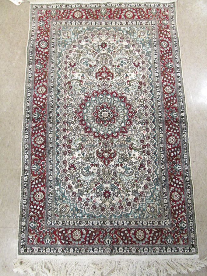 Appraisal: SILK INDO-PERSIAN AREA RUG floral and central floral medallion design