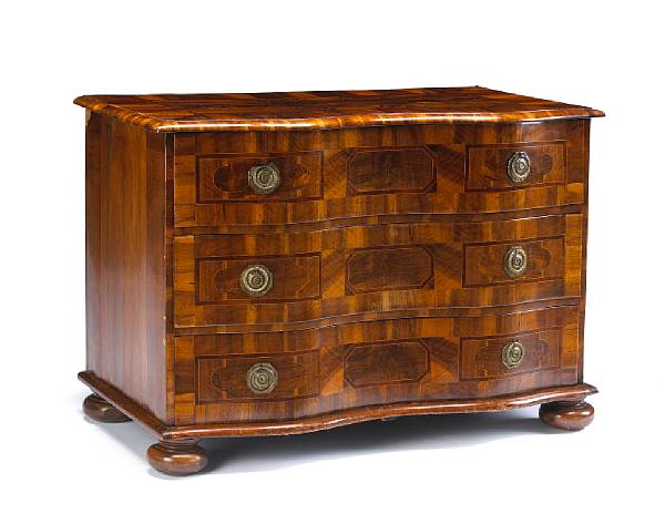 Appraisal: A German Baroque parquetry and walnut chest of drawers early