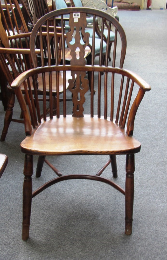 Appraisal: A George III yew and elm Windsor chair with pierced