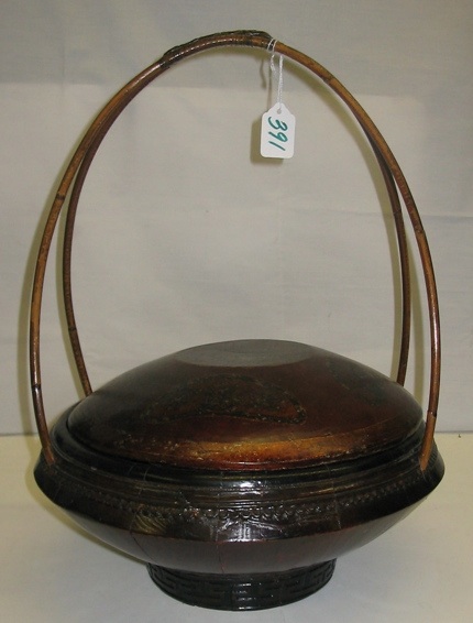 Appraisal: A CHINESE LACQUERED RICE CARRIER double arch handle The lid