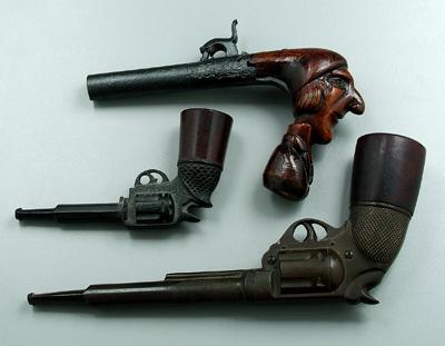 Appraisal: Three novelty pipes two with bakelite bodies one with briar