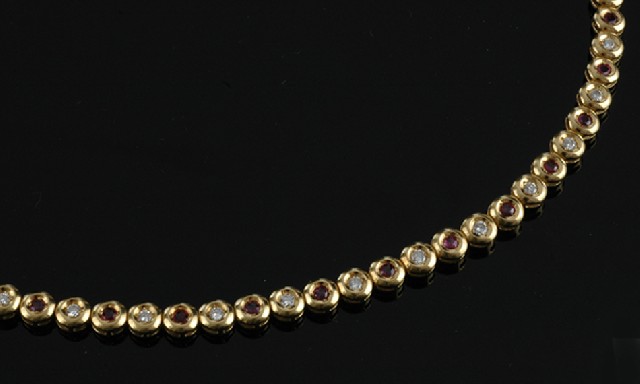 Appraisal: A ruby and diamond line bracelet Comprising fifteen round cut