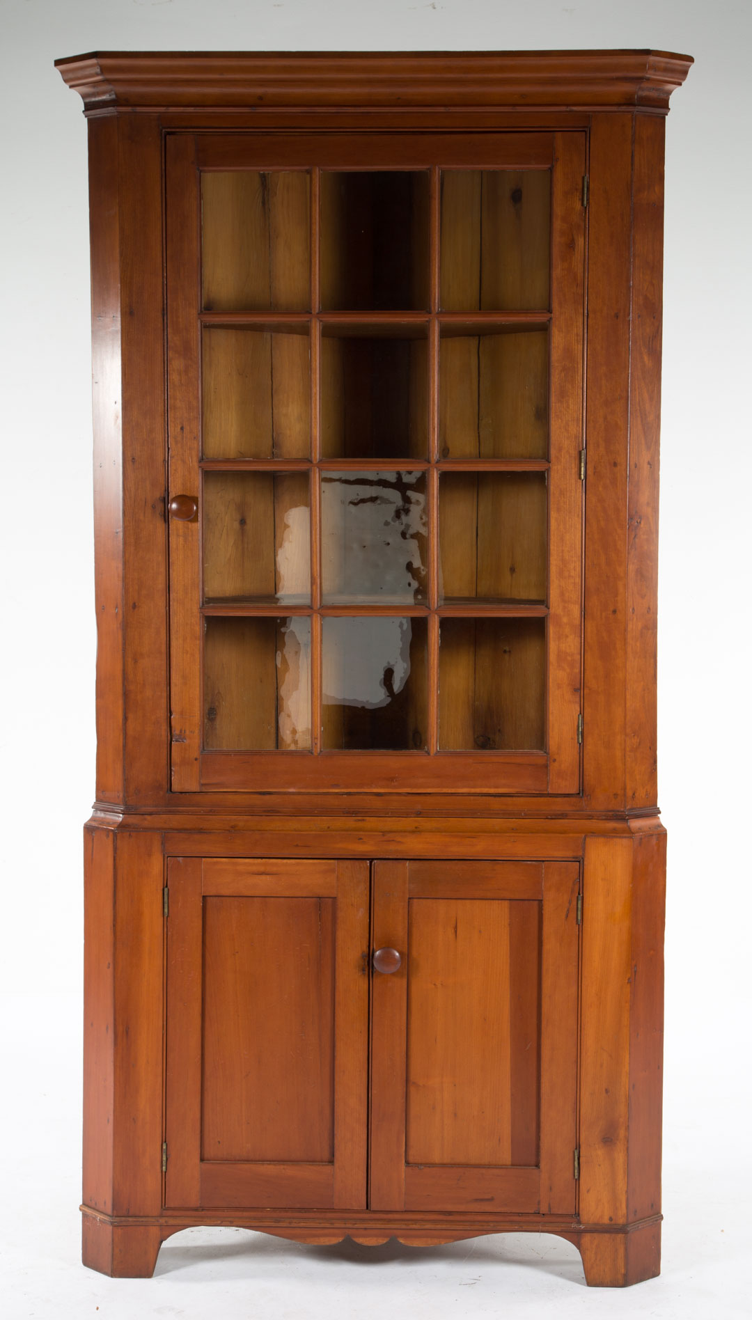 Appraisal: American vernacular cherrywood corner cupboard first half- th century flat