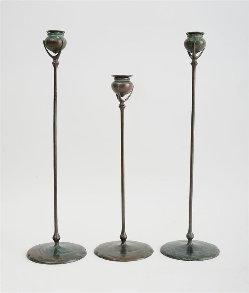 Appraisal: PAIR OF TIFFANY STUDIOS BRONZE TALL CANDLESTICKS AND SINGLE STICK