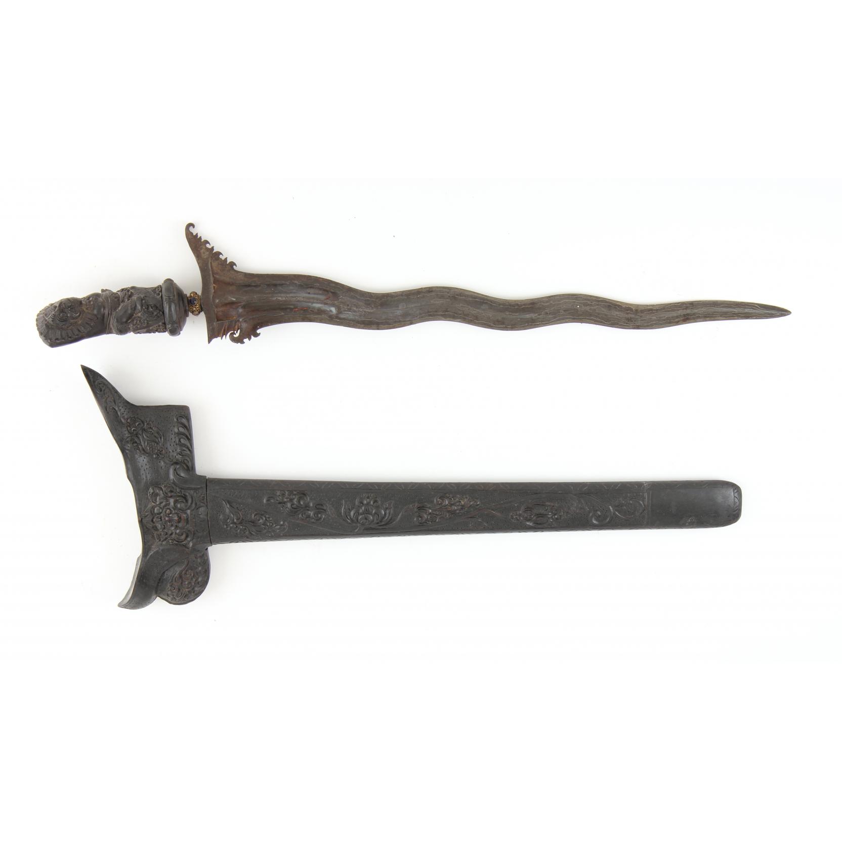 Appraisal: Indonesian Kris likely early th century the scabbard and figural