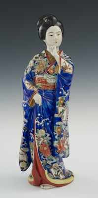 Appraisal: A Glazed Kutani Figure of a Bijin Apprx H the