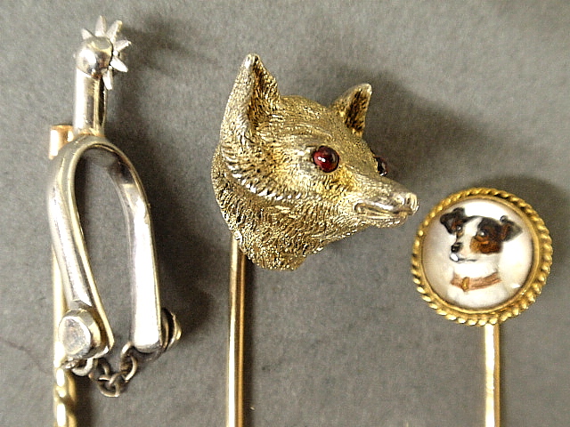 Appraisal: - Three fine equine themed stickpins- platinum spur with chain