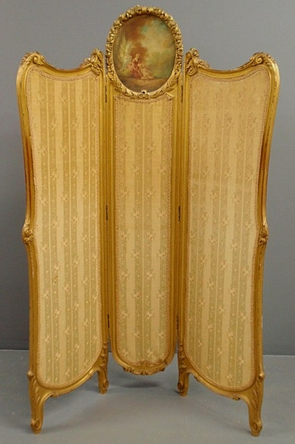 Appraisal: Louis XVI style carved gilt decorated three-part screen with printed