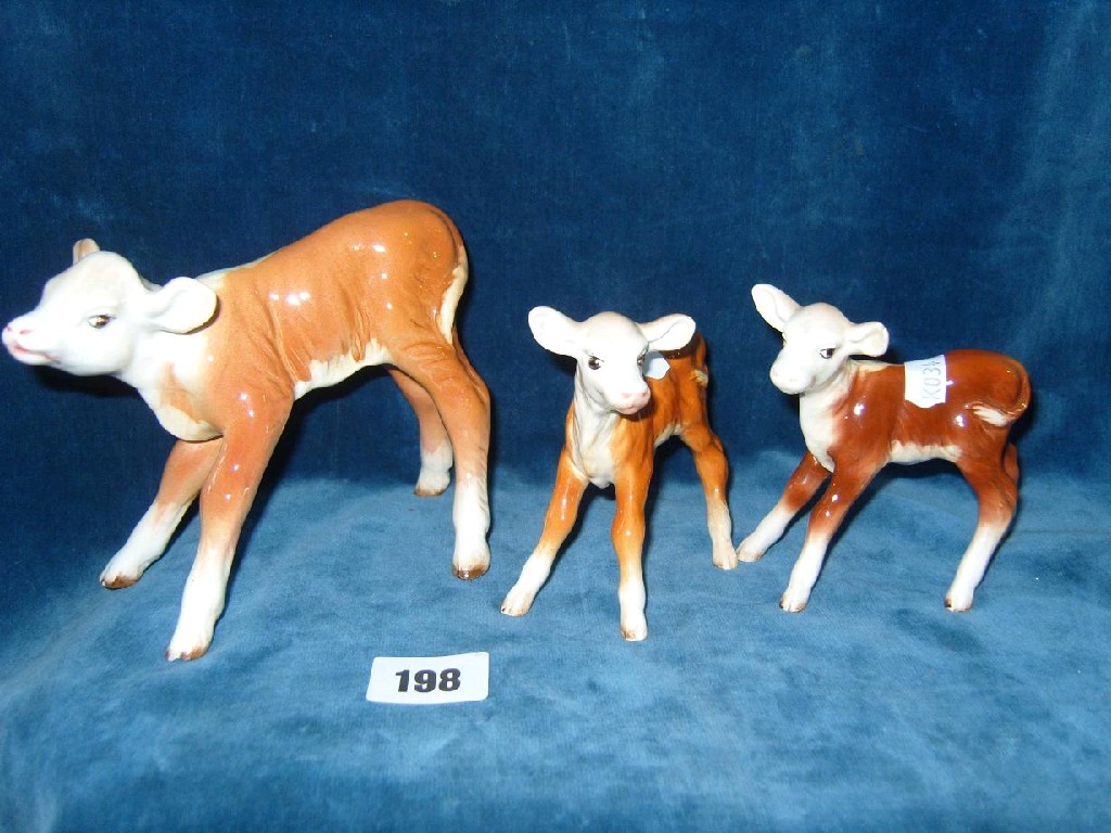 Appraisal: A large Beswick model of a Hereford calf and two