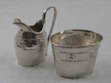 Appraisal: A hand raised Art and Crafts silver cream jug cm