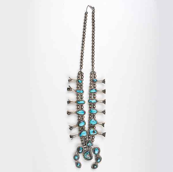 Appraisal: Navajo Silver and Turquoise Squash Blossom with graduated blossoms and